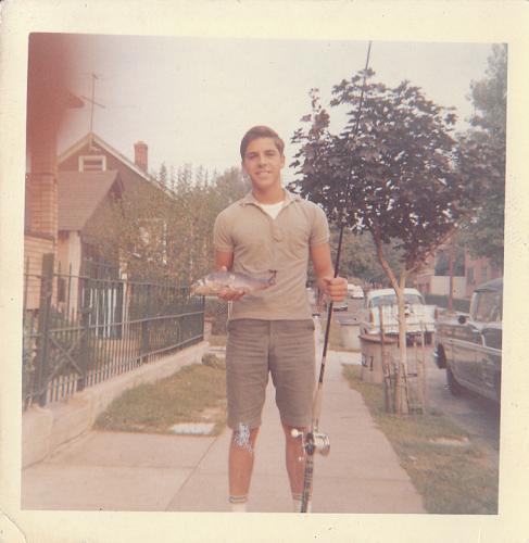Louis as a teen fishing